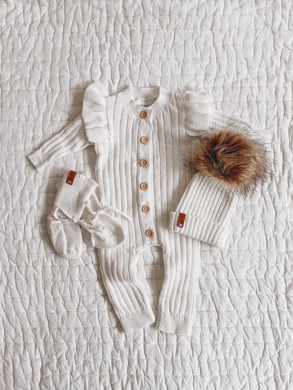 Indigo Dreams Frill Romper vauvan neulehaalari, Vanilla