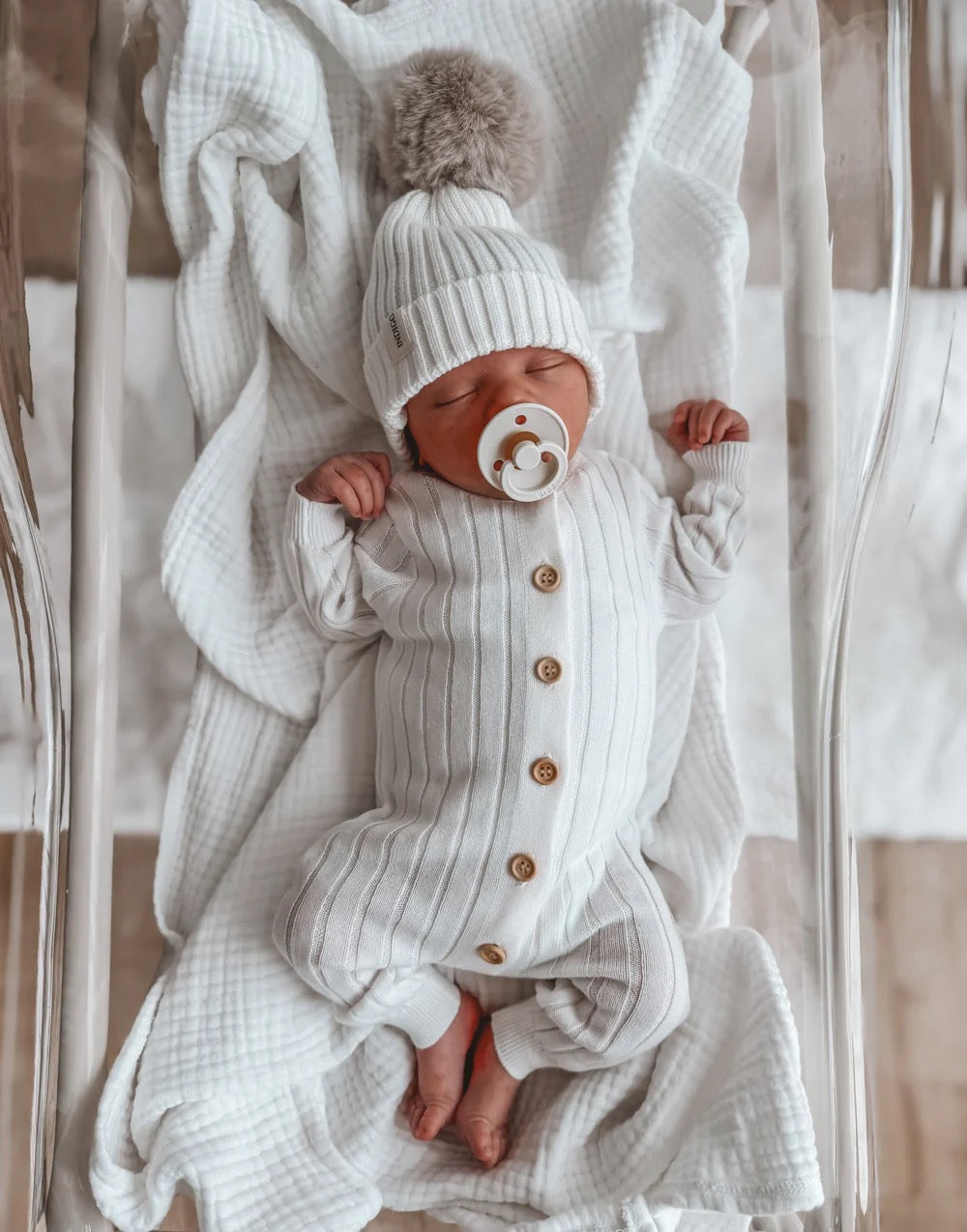 Indigo Dreams Vanilla Romper vauvan neulehaalari